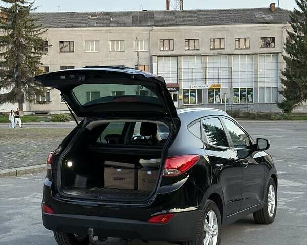 Чорний Хендай іх35, об'ємом двигуна 2 л та пробігом 173 тис. км за 13800 $, фото 18 на Automoto.ua
