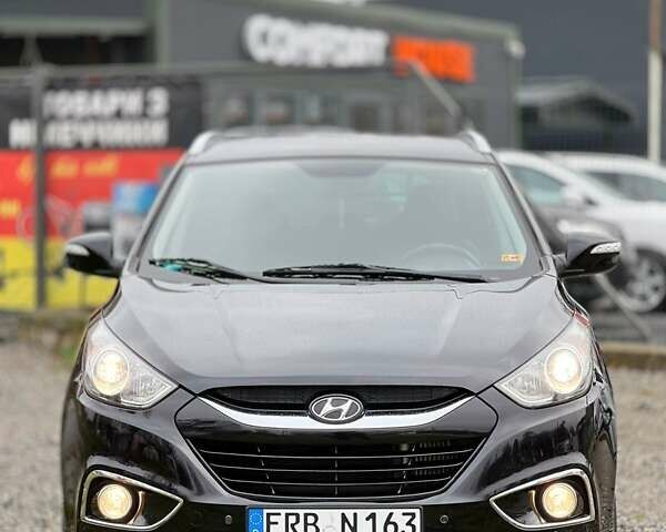 Чорний Хендай іх35, об'ємом двигуна 2 л та пробігом 195 тис. км за 12800 $, фото 23 на Automoto.ua