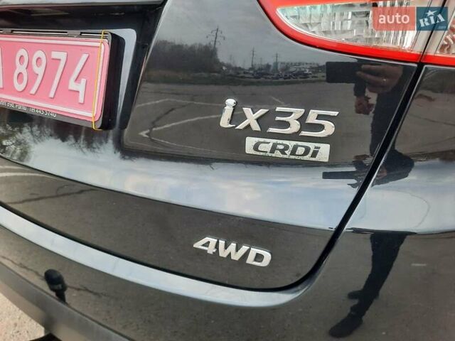 Чорний Хендай іх35, об'ємом двигуна 2 л та пробігом 211 тис. км за 12700 $, фото 86 на Automoto.ua