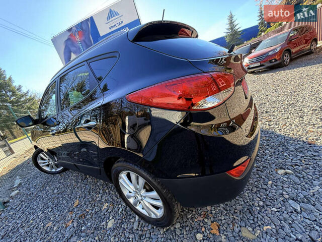 Чорний Хендай іх35, об'ємом двигуна 2 л та пробігом 153 тис. км за 13999 $, фото 86 на Automoto.ua