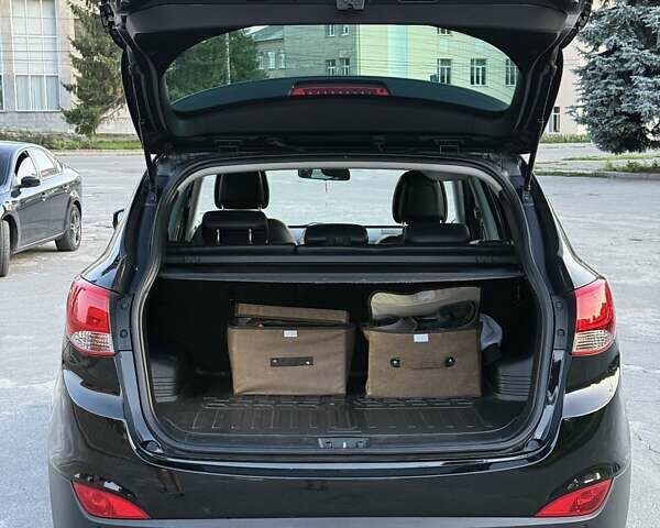 Чорний Хендай іх35, об'ємом двигуна 2 л та пробігом 173 тис. км за 13800 $, фото 22 на Automoto.ua