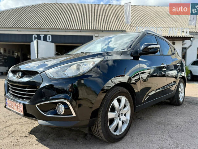 Чорний Хендай іх35, об'ємом двигуна 2 л та пробігом 253 тис. км за 13000 $, фото 12 на Automoto.ua
