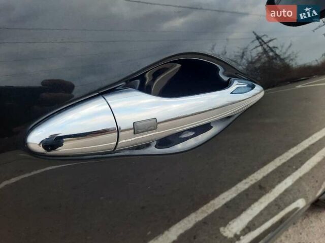 Чорний Хендай іх35, об'ємом двигуна 2 л та пробігом 211 тис. км за 12700 $, фото 104 на Automoto.ua