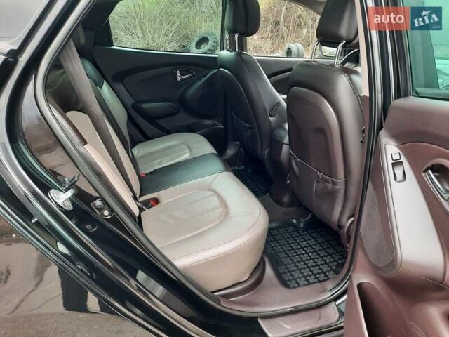 Чорний Хендай іх35, об'ємом двигуна 2 л та пробігом 211 тис. км за 12700 $, фото 99 на Automoto.ua