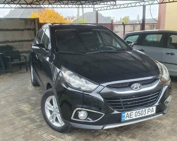 Чорний Хендай іх35, об'ємом двигуна 2 л та пробігом 148 тис. км за 12800 $, фото 4 на Automoto.ua