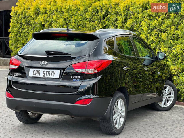 Черный Хендай их35, объемом двигателя 1.69 л и пробегом 238 тыс. км за 11999 $, фото 2 на Automoto.ua