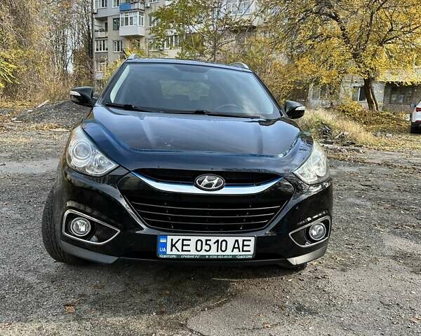 Черный Хендай их35, объемом двигателя 2 л и пробегом 137 тыс. км за 14000 $, фото 1 на Automoto.ua