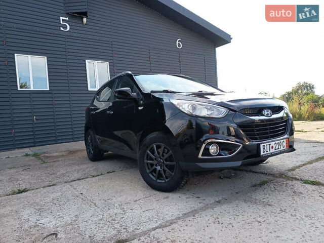 Хендай их35 2012 в Житомире на Automoto.ua Черный Хендай их35, объемом двигателя 2 л и пробегом 195 тыс. км за 12600 $, фото 5 на Automoto.ua