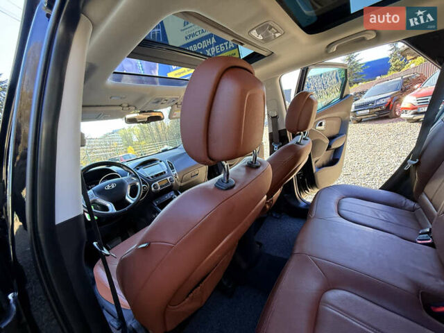 Чорний Хендай іх35, об'ємом двигуна 2 л та пробігом 153 тис. км за 13999 $, фото 30 на Automoto.ua
