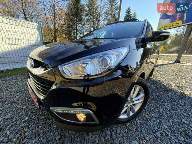 Чорний Хендай іх35, об'ємом двигуна 2 л та пробігом 153 тис. км за 13999 $, фото 2 на Automoto.ua