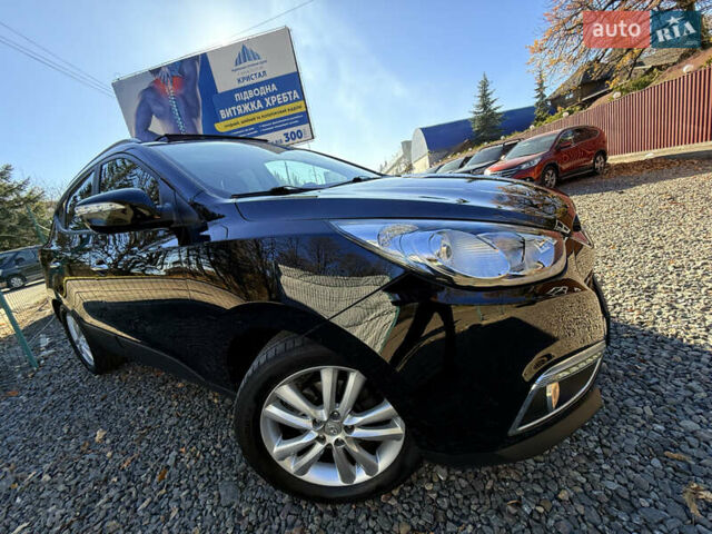 Чорний Хендай іх35, об'ємом двигуна 2 л та пробігом 153 тис. км за 13999 $, фото 83 на Automoto.ua