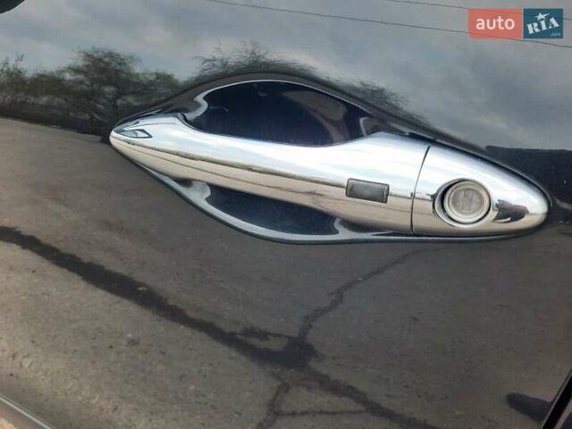 Чорний Хендай іх35, об'ємом двигуна 2 л та пробігом 211 тис. км за 12700 $, фото 32 на Automoto.ua