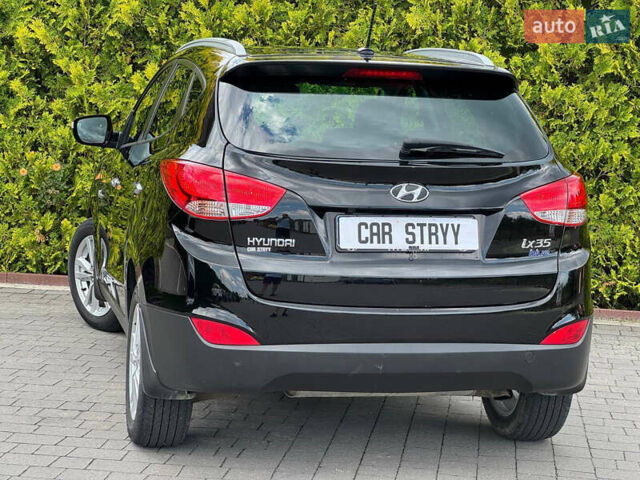 Черный Хендай их35, объемом двигателя 1.69 л и пробегом 238 тыс. км за 11999 $, фото 25 на Automoto.ua