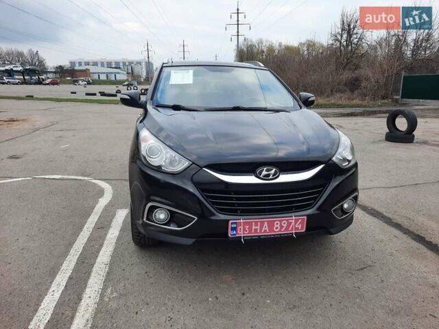 Чорний Хендай іх35, об'ємом двигуна 2 л та пробігом 211 тис. км за 12700 $, фото 3 на Automoto.ua