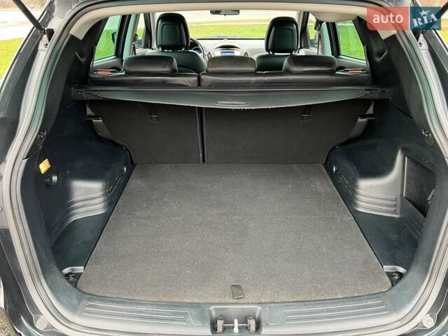 Чорний Хендай іх35, об'ємом двигуна 2 л та пробігом 195 тис. км за 12800 $, фото 16 на Automoto.ua