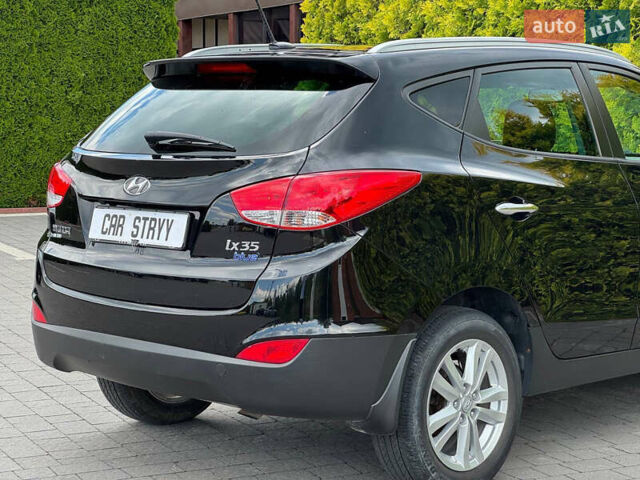 Черный Хендай их35, объемом двигателя 1.69 л и пробегом 238 тыс. км за 11999 $, фото 18 на Automoto.ua