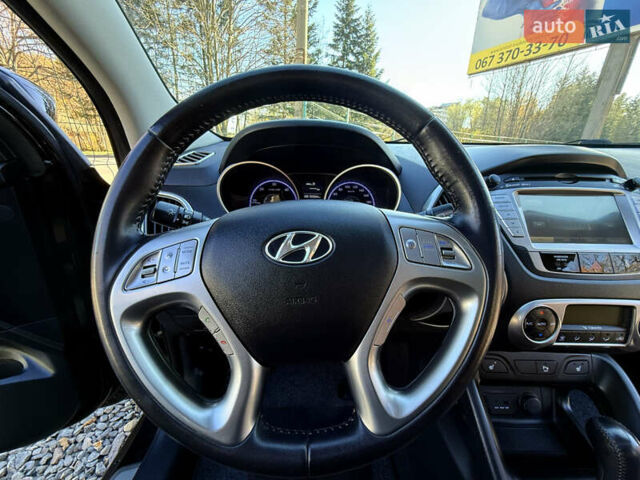 Чорний Хендай іх35, об'ємом двигуна 2 л та пробігом 153 тис. км за 13999 $, фото 48 на Automoto.ua