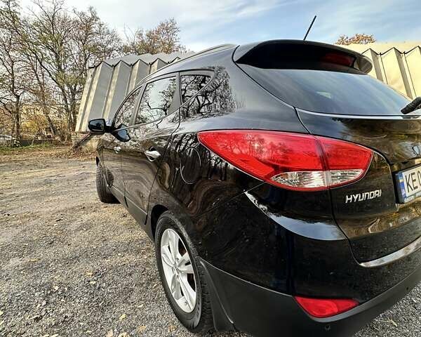 Черный Хендай их35, объемом двигателя 2 л и пробегом 137 тыс. км за 14000 $, фото 7 на Automoto.ua