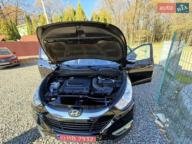 Чорний Хендай іх35, об'ємом двигуна 2 л та пробігом 153 тис. км за 13999 $, фото 67 на Automoto.ua