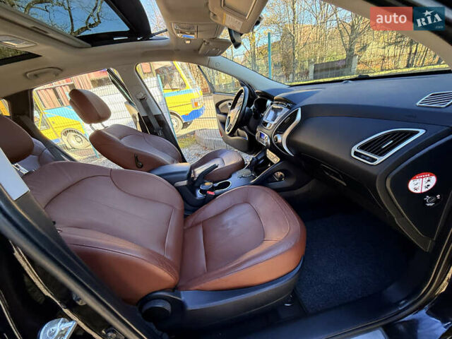 Чорний Хендай іх35, об'ємом двигуна 2 л та пробігом 153 тис. км за 13999 $, фото 63 на Automoto.ua