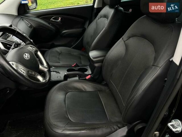 Чорний Хендай іх35, об'ємом двигуна 2 л та пробігом 195 тис. км за 12800 $, фото 9 на Automoto.ua