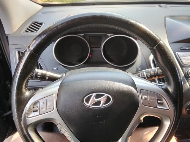 Чорний Хендай іх35, об'ємом двигуна 2 л та пробігом 180 тис. км за 12999 $, фото 19 на Automoto.ua