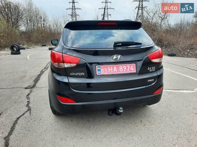 Чорний Хендай іх35, об'ємом двигуна 2 л та пробігом 211 тис. км за 12700 $, фото 14 на Automoto.ua
