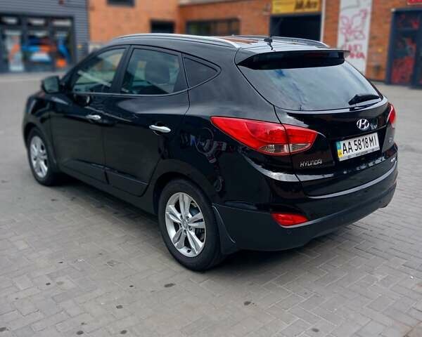 Чорний Хендай іх35, об'ємом двигуна 2 л та пробігом 189 тис. км за 12200 $, фото 4 на Automoto.ua