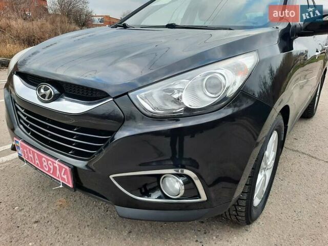 Чорний Хендай іх35, об'ємом двигуна 2 л та пробігом 211 тис. км за 12700 $, фото 25 на Automoto.ua