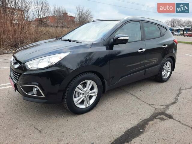 Чорний Хендай іх35, об'ємом двигуна 2 л та пробігом 211 тис. км за 12700 $, фото 8 на Automoto.ua