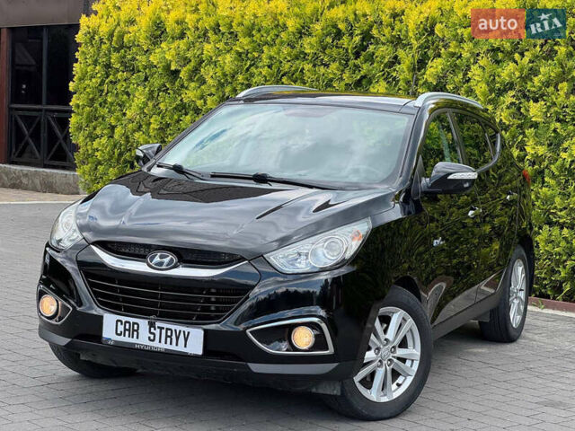 Черный Хендай их35, объемом двигателя 1.69 л и пробегом 238 тыс. км за 11999 $, фото 1 на Automoto.ua