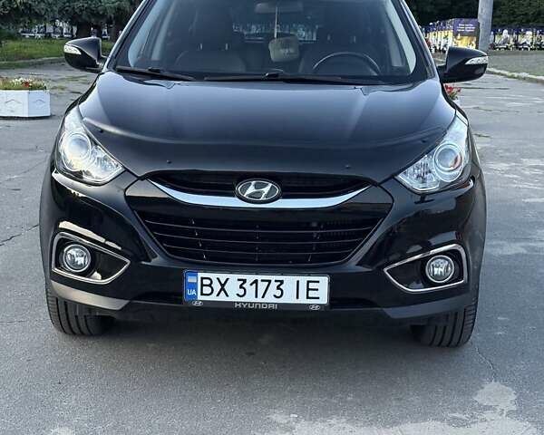 Чорний Хендай іх35, об'ємом двигуна 2 л та пробігом 173 тис. км за 13800 $, фото 1 на Automoto.ua
