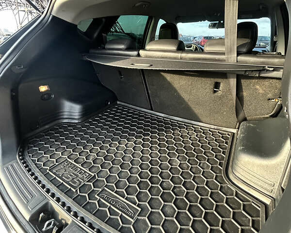 Чорний Хендай іх35, об'ємом двигуна 2 л та пробігом 241 тис. км за 14400 $, фото 19 на Automoto.ua