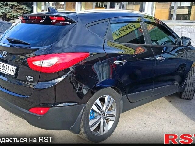 Чорний Хендай іх35, об'ємом двигуна 2 л та пробігом 167 тис. км за 13800 $, фото 3 на Automoto.ua