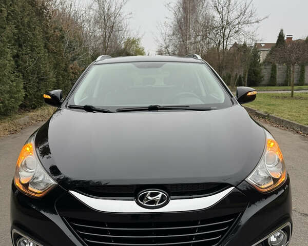 Чорний Хендай іх35, об'ємом двигуна 2 л та пробігом 177 тис. км за 14650 $, фото 13 на Automoto.ua