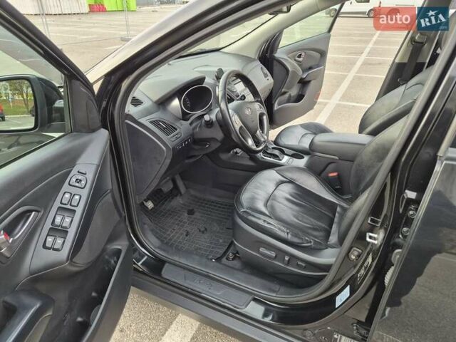 Хендай их35 2013 в Киеве на Automoto.ua Черный Хендай их35, объемом двигателя 2 л и пробегом 153 тыс. км за 13500 $, фото 18 на Automoto.ua