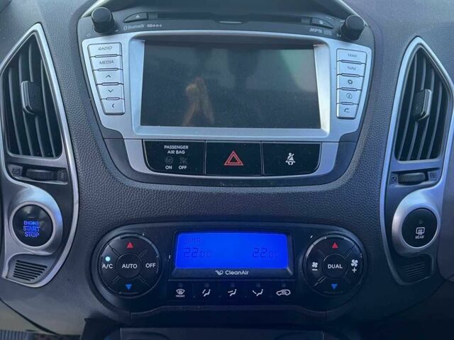 Чорний Хендай іх35, об'ємом двигуна 2 л та пробігом 178 тис. км за 13700 $, фото 12 на Automoto.ua