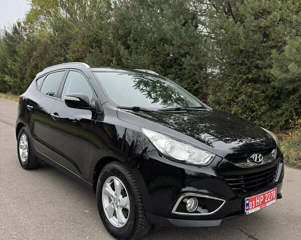 Чорний Хендай іх35, об'ємом двигуна 2 л та пробігом 177 тис. км за 14650 $, фото 3 на Automoto.ua