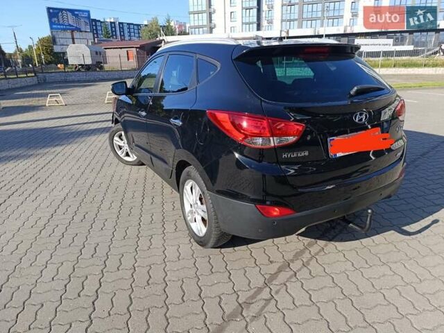 Чорний Хендай іх35, об'ємом двигуна 2 л та пробігом 237 тис. км за 12950 $, фото 18 на Automoto.ua