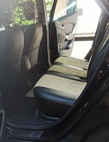 Черный Хендай их35, объемом двигателя 2 л и пробегом 162 тыс. км за 13850 $, фото 6 на Automoto.ua