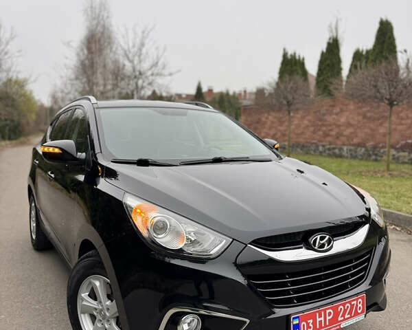Чорний Хендай іх35, об'ємом двигуна 2 л та пробігом 177 тис. км за 14650 $, фото 12 на Automoto.ua