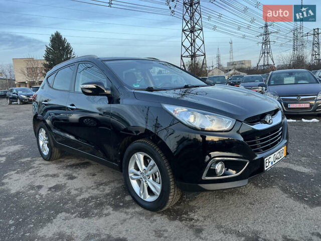 Черный Хендай их35, объемом двигателя 2 л и пробегом 213 тыс. км за 16500 $, фото 3 на Automoto.ua