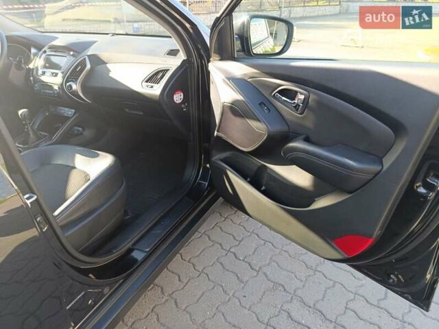 Чорний Хендай іх35, об'ємом двигуна 2 л та пробігом 237 тис. км за 12950 $, фото 6 на Automoto.ua