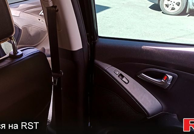 Чорний Хендай іх35, об'ємом двигуна 2 л та пробігом 167 тис. км за 13800 $, фото 9 на Automoto.ua