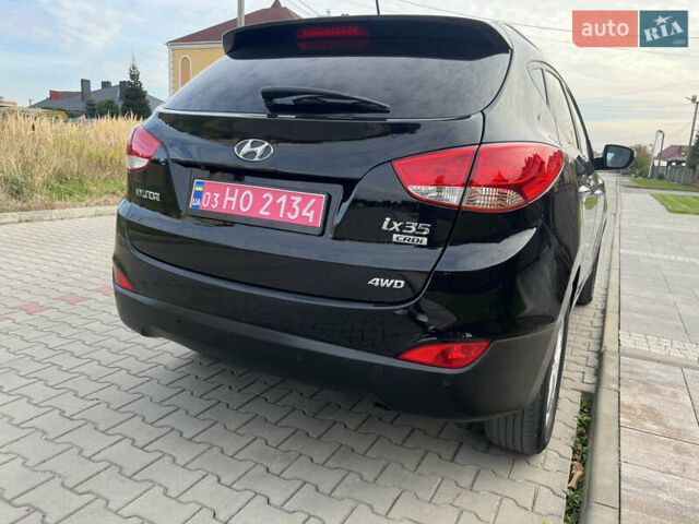 Черный Хендай их35, объемом двигателя 2 л и пробегом 202 тыс. км за 15700 $, фото 3 на Automoto.ua