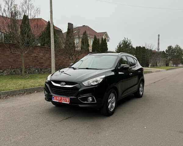 Чорний Хендай іх35, об'ємом двигуна 2 л та пробігом 177 тис. км за 14650 $, фото 15 на Automoto.ua