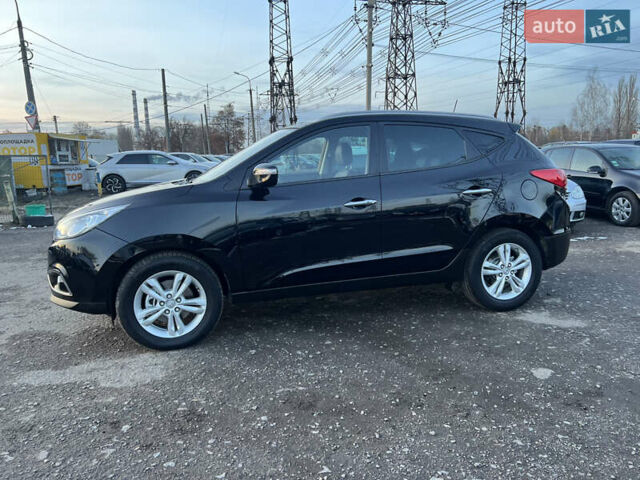 Черный Хендай их35, объемом двигателя 2 л и пробегом 213 тыс. км за 16500 $, фото 6 на Automoto.ua