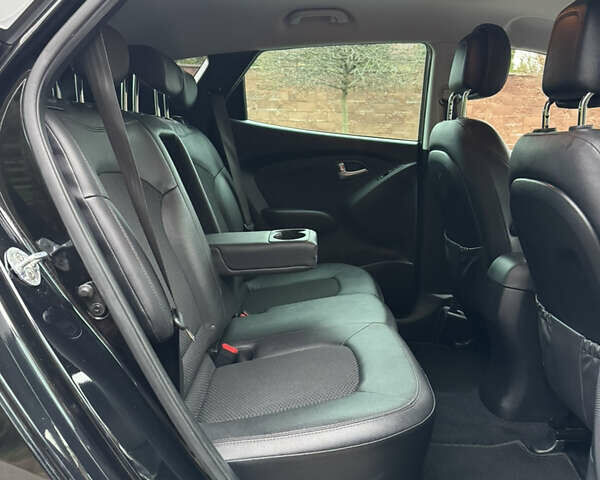 Чорний Хендай іх35, об'ємом двигуна 2 л та пробігом 177 тис. км за 14650 $, фото 56 на Automoto.ua