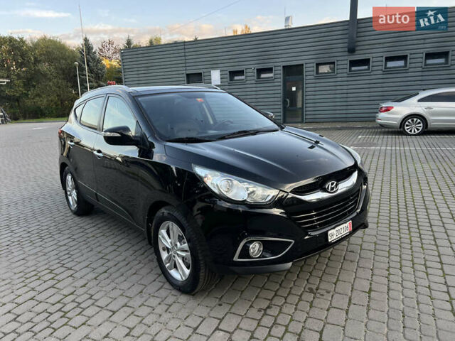 Черный Хендай их35, объемом двигателя 2 л и пробегом 175 тыс. км за 13900 $, фото 16 на Automoto.ua