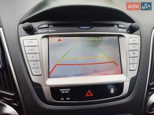 Хендай их35 2013 в Житомире на Automoto.ua Черный Хендай их35, объемом двигателя 1.7 л и пробегом 158 тыс. км за 11900 $, фото 58 на Automoto.ua